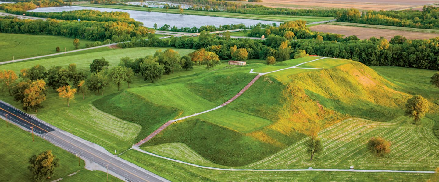 Bird&apos;s eye view of the village in modern day as merely green hills