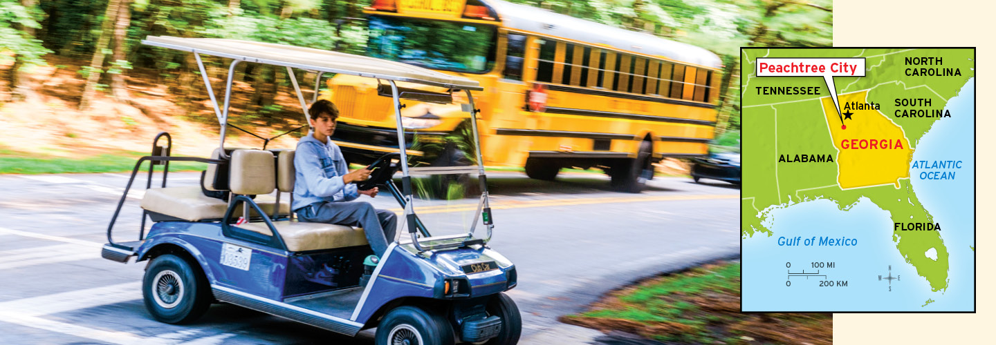 Photo of a kid driving a golf cart and map showing Peachtree City, Georgia